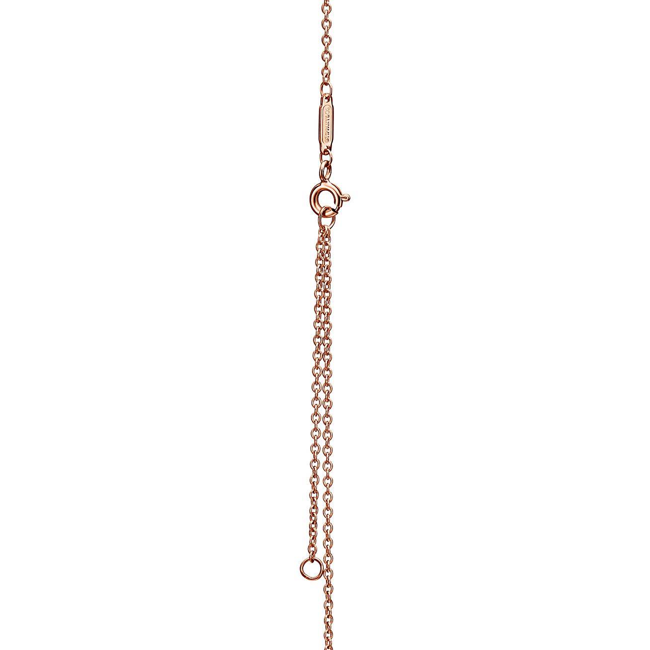 TIFFANY KNOT PENDANT IN ROSE GOLD WITH DIAMONDS