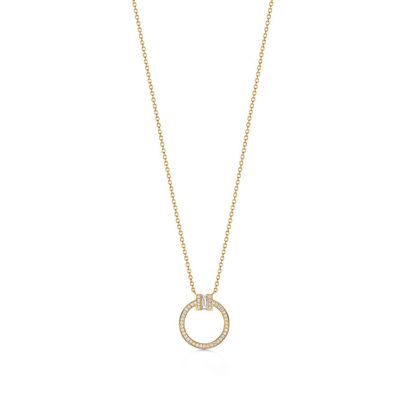 Tiffany T Diamond Pendant in 18k Gold with a Baguette Diamond